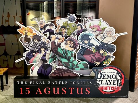 Jakarta, Indonesia - August 20th, 2025 - Demon Slayer Kimetsu no Yaiba Infinity Castle the movie standee banner poster board in CGV cinema indoor environment background.