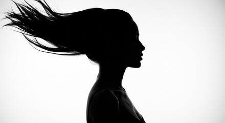 Dark silhouette of a woman with blowing hair, profile view against a stark white background, minimalist and artistic © Erisna Yolanda