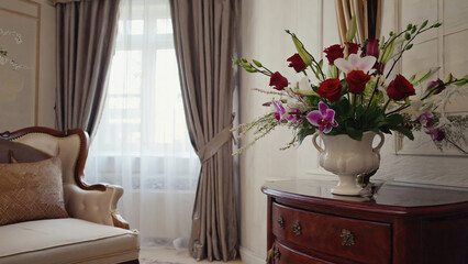 Beautiful flowers vase on the table in a bed room Background. Ai generated.