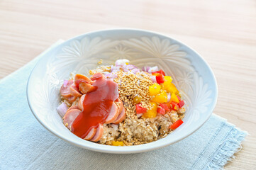 米化したクイックオーツに具材と調味料を加える