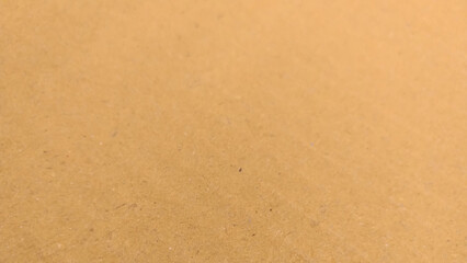 Background of brown kraft paper or cardboard texture, Beige surface background texture light rough textured spotted blank.