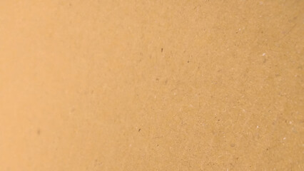 Background of brown kraft paper or cardboard texture, Beige surface background texture light rough textured spotted blank.