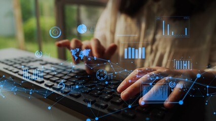 A close-up of hands typing on a keyboard, complemented by a digital interface overlay featuring graphs and charts that symbolize data analysis and innovation in a modern workspace. Xenic