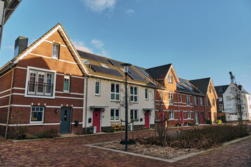 Modern residential street with solar panel houses in Assen, Netherlands