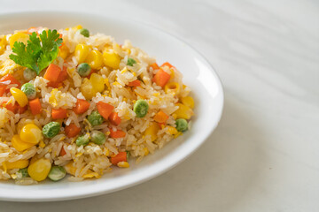 fried rice with mixed vegetable (carrot, green bean peas, corn) and egg