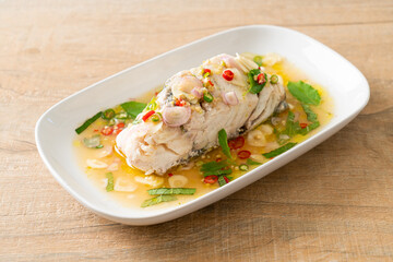 steamed sea bass fish with herbs