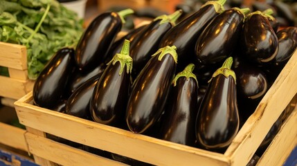 Fresh Eggplants in Wooden Crate at Market