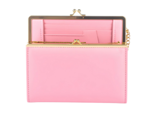 A pink fashionable clutch purse for women isolated on transparent background.
