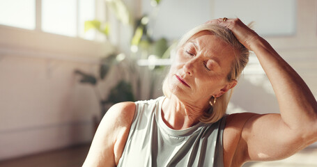Yoga, meditation and old woman in studio, stretching and chakra with wellness, zen and mindfulness. Pensioner, yogi and mature person with stress relief, health and peaceful with warm up and fitness