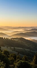 Misty Sunrise Over Rolling Hills