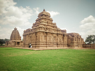 Intricate temple sculptures of Badami in Karnataka, showcasing ancient rock-cut art, mythological...