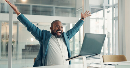 Business, black man and cheering with laptop in office for good news, positive feedback or story award. Excited, mature journalist and pc of article success, media recognition and publication victory