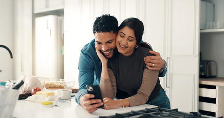 Happy couple, hug and phone in kitchen for social media, picture memories and love post on app....