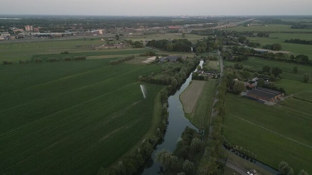 Water canal and agricultural fields near Breukelen township, aerial view