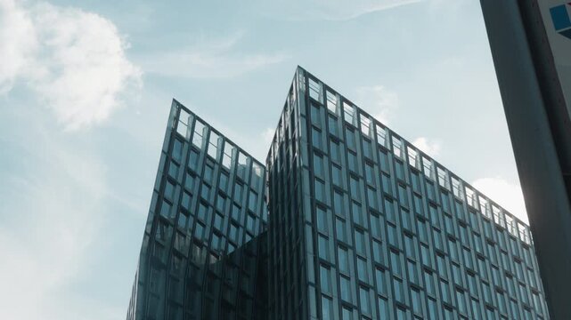 Modern skyscraper Tanzende Türme in Hamburg against blue sky. Ideal for urban development projects or architecture showcases. St. Pauli, Hamburg.