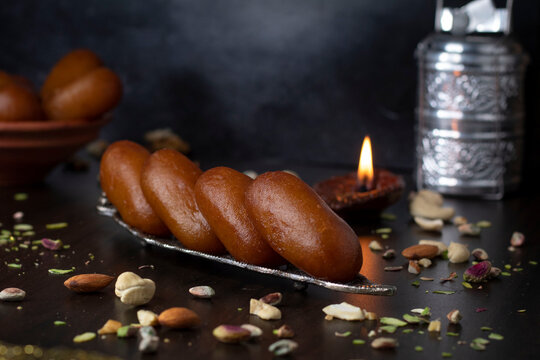 gulab jamun sweet spongy fried indian dessert stacked 