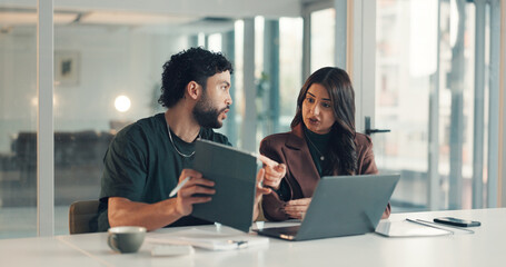 Meeting, problem solving or tech support with man and woman in office together for troubleshooting....