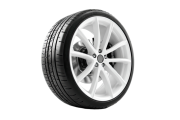 White alloy wheel and tire, studio shot