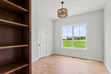 Bright living room interior in modern apartment with large windows
Clean white kitchen with stainless appliances in contemporary condo