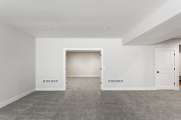 Bright living room interior in modern apartment with large windows
Clean white kitchen with stainless appliances in contemporary condo