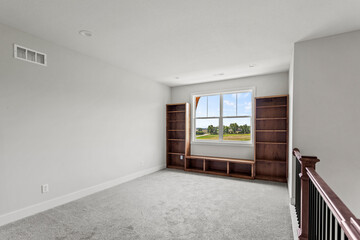 Bright living room interior in modern apartment with large windows
Clean white kitchen with stainless appliances in contemporary condo