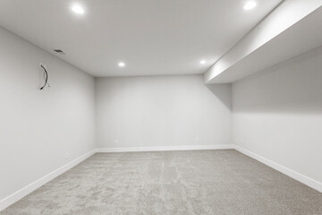 Bright living room interior in modern apartment with large windows
Clean white kitchen with stainless appliances in contemporary condo