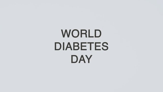 World Diabetes Day concept word hand holding stethoscope on white background for diabetes awareness, monitoring, prevention, treatment, wellness, and medical health education