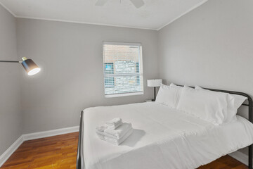 Bright living room interior in modern apartment with large windows
Clean white kitchen with stainless appliances in contemporary condo