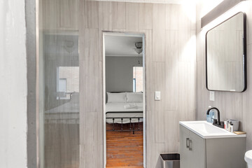 Bright living room interior in modern apartment with large windows
Clean white kitchen with stainless appliances in contemporary condo