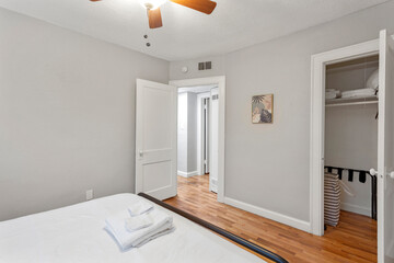 Bright living room interior in modern apartment with large windows
Clean white kitchen with stainless appliances in contemporary condo