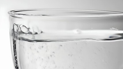 Liquid chrome gradient motion, fluid metallic surface. Clear glass with bubbles from pouring water, minimalistic background - Powered by Adobe