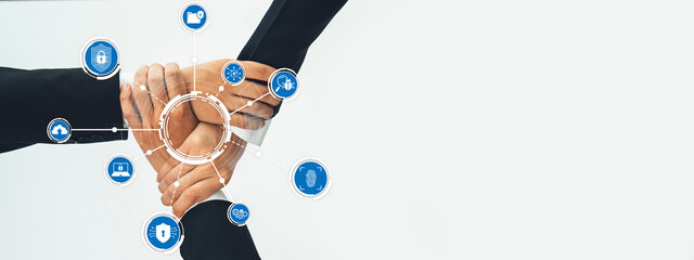 Office worker team stacking hand together symbolize successful group of business partnership and strong collective unity teamwork in community workplace in panoramic banner. Shrewd Amity