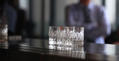 glass of whiskey on table