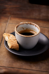 Cup of coffee on wooden background. Soft focus. Copy space	