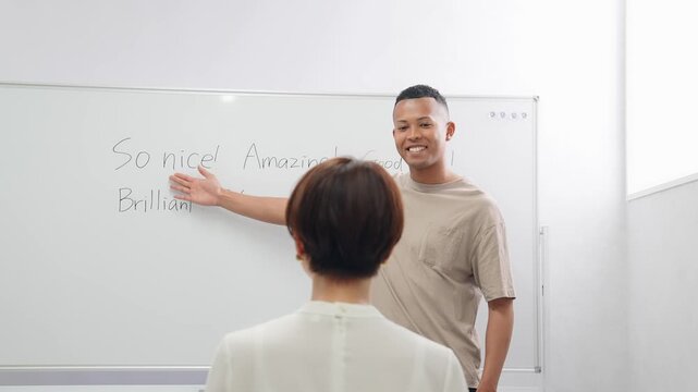 A black male teacher giving an English lesson