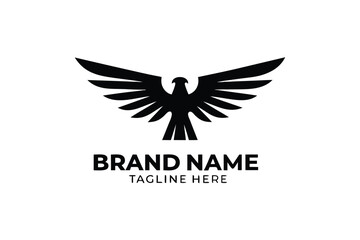 Elegant Eagle Silhouette Spreading Wings on White Background Logo Design