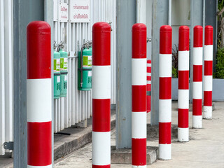 Hua Hin, Thailand - June 26, 2025: Safety barriers near gas equipment at shopping mall facility area ensuring protection and secure infrastructure