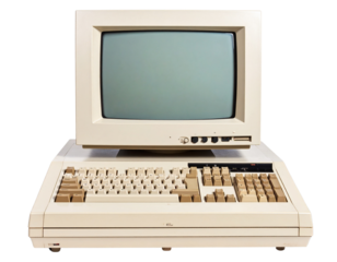 A - Vintage Beige Desktop Computer with Monitor and Keyboard, Front View, Isolated on Black Background.