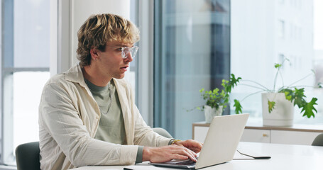 Reading, glasses and laptop with business man in office for article source, publisher schedule or research. Journalist report, draft editing and planning with person in media agency for magazine