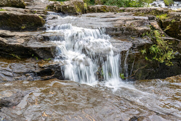 Obraz premium Falls of Dochart rapids in Killin, Tayside, Scotland