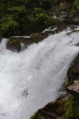 Waterfall in Geiranger village in Norway