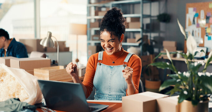 Happy woman, fist pump and winning with laptop in logistics for good news, online review or deal. Female person, distributor or small business owner with smile in celebration for distribution success