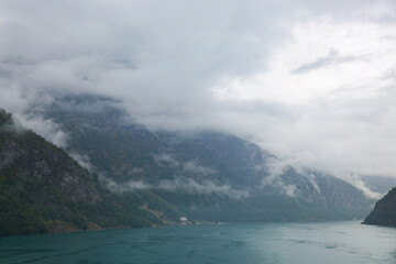 Foggy landscape of the fjord in norway.