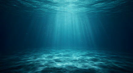 Submerged radiance, an underwater perspective showcases beams of light penetrating through the ocean surface