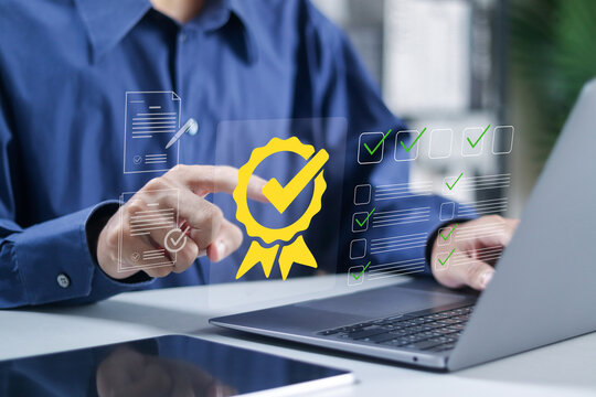 Digital certificate concept, Quality management, Standardization and certification. Businessman using laptop with checklist documents, assessment for certificate and document approved.