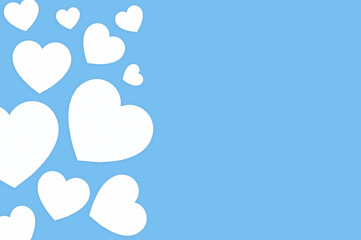 White hearts on a blue background with text space, perfect for a postcard