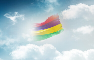 Mauritius flag waving light background hidden in the sky.