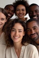 Obraz premium Group of smiling young adults of diverse backgrounds posing together
