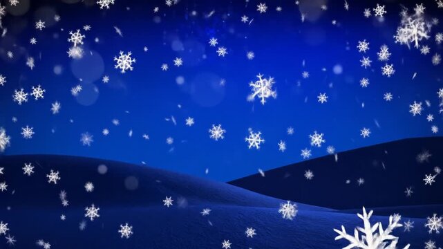 Snowy hills meet a vibrant blue sky with soft, falling snowflakes creating a peaceful winter scene