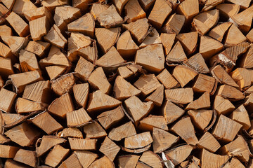 Background image - a stack of split birch firewood